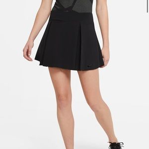 Two pairs Nike womens golf skirts brand new with tags